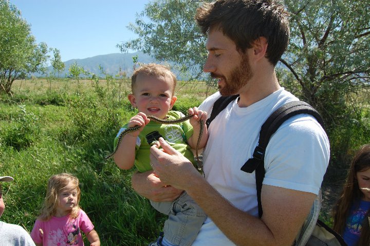 Gavin introducing his son to a Garter Snake
